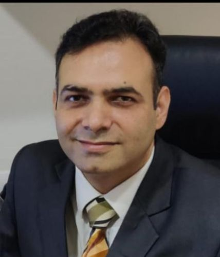 Dr. Dinesh